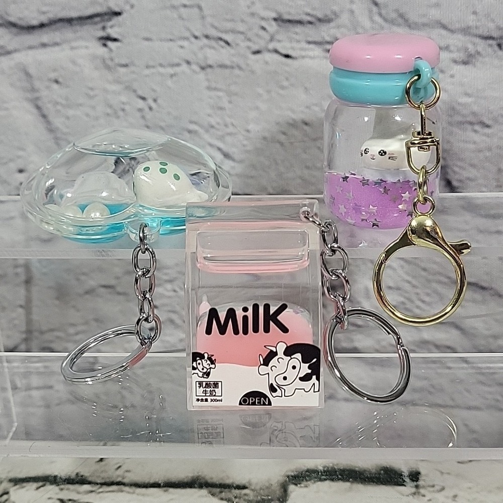 Anime Novelty Blind Bag Keychains Lot Of 3 Water Oil Filled Floating Pink Milk